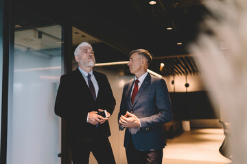 Serious businessmen in modern office