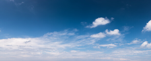Naklejka na ściany i meble Panoramic beautiful sky with white clouds.