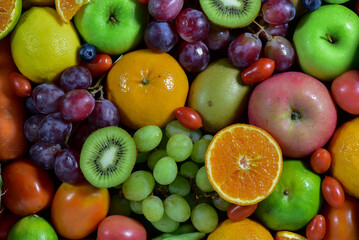 Naklejka na ściany i meble Fresh fruits, assorted fruits, colorful background. Healthy fruits and vegetables concept.