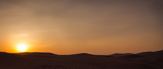 Fototapeta na wymiar Smoky desert sunset.