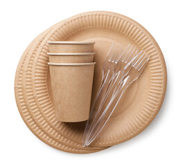 Disposable tableware. Plates, cups and forks on a white background. Top view