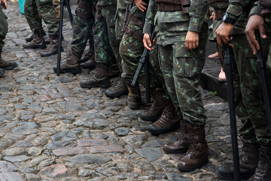 Military police officers stand guard during the civic independence parade of Bahia in Pelourinho, in Salvador.