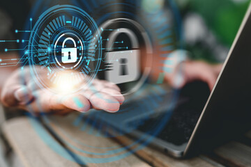 Cyber security network. Data protection concept. Businessman using laptop computer with digital padlock on internet technology networking with cloud computing and data management, cybersecurity.