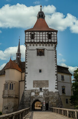 Fototapeta premium Stone gate leading to the Gothic castle tower of Blatna