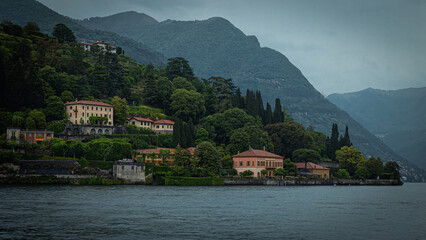 Fototapeta na wymiar Famous and beautiful small towns on Lake Como in Italy. Beautiful small towns with old streets, villas, beautiful gardens and nice restaurants.Lombardy region