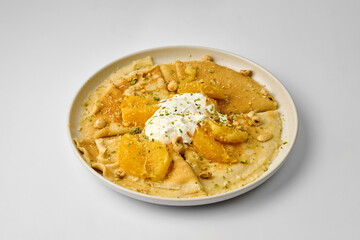Crepe Suzette - Pancakes in orange sauce with ice cream