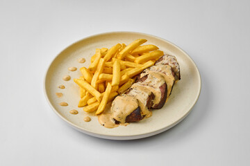 Filet Mignon with pepper sauce and French fries