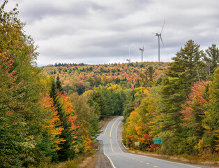 Autumn colors - Wind turbines in rural Maine highway 16