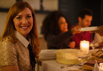 Portrait smiling woman at candlelight table