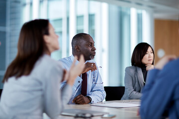Business people listening in meeting