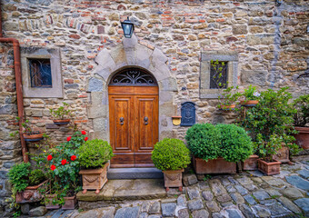 Fototapeta na wymiar Door in the Etruscan city of Cortona, Tuscany Italy