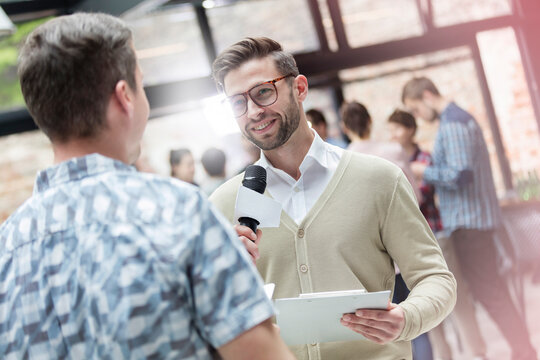 Speaker with microphone at technology conference