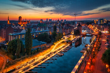 Fototapeta premium The Main Town of Gdansk by the Motlawa riover at sunset, Poland
