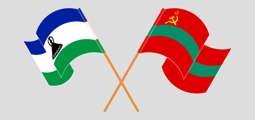 Crossed and waving flags of Lesotho and Transnistria