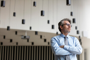 Pensive businessman looking away