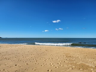pé na areia de praia