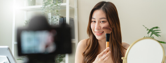 freelance content creator beauty blogger, beautiful woman streaming online guiding makeup tutorial...