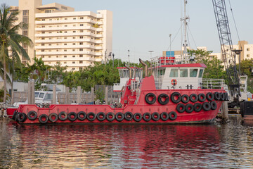 Tug boats at river side in Miami River Drive area © James