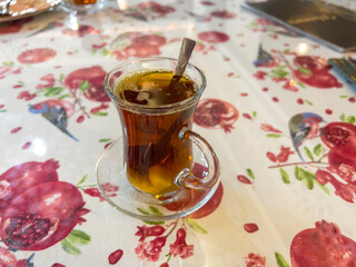 Glass with hot black tea