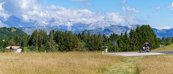 person riding a bike in mountains
