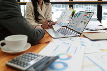 Fund managers team consultation and discuss about analysis Investment stock market by digital tablet