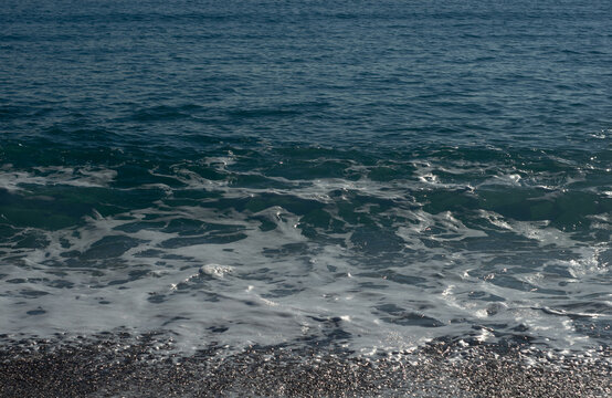 Sea waves on a sand beach