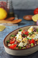 A bowl with Piyaz salad - traditional dish of Turkey