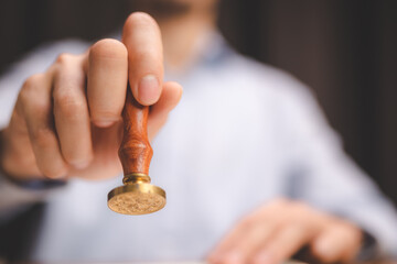 business approve and certificate concept, confirmation of business marketing document permit and certified stamping, signing on business partner paper to success, or concept of attorney and insurance