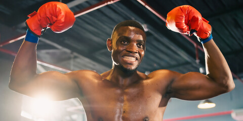 Inspirational exercise and fitness portrait of African American male athlete, intense and powerful...