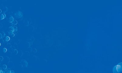 Light abstract blue bokeh christmas circle color glitter background