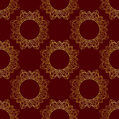 golden ethnic pattern design on deep red background