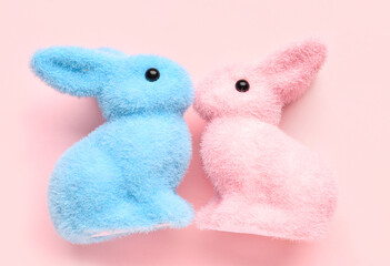 Cute bunnies for Friendship Day on pink background