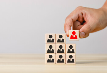 social network of human resources Assessment center concept Personal auditing or CRM concept. Whole team recruiter with one person shown with wooden cubes with icons.