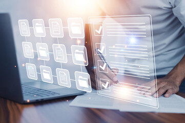 Document Checklist concept, Businessman using computer for DMS documents management and ERP...