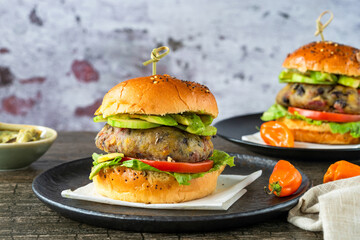 Plantain and black bean burger in brioche bun