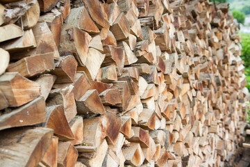firewood stacked in a pile for the stove