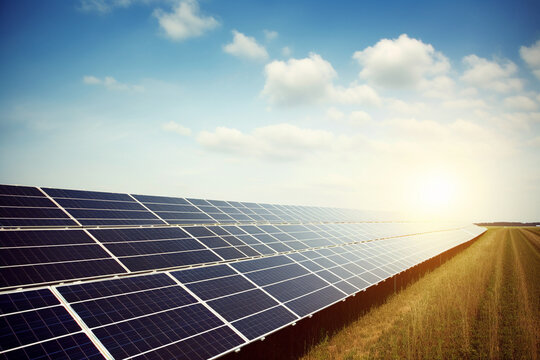 Solar panels on a field, Harnessing the Sun: A Captivating Photograph of a Rooftop Adorned with Vibrant Solar Panels, Paving the Way for Decentralized Energy Production and Embracing Solar Power