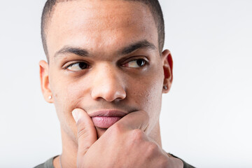 Black man ponders, idea or deception suspicion