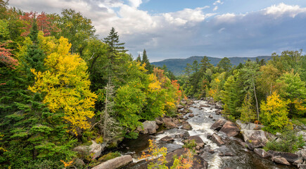 Autumn colors on the Magalloway River in western Maine - scenic drive on Highway 16
