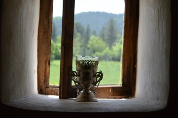 an old lamp on the window