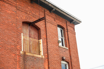 Brick buildings: icons of stability, progress, and community. Offices and apartment complexes symbolize growth, urban living, and shared aspirations