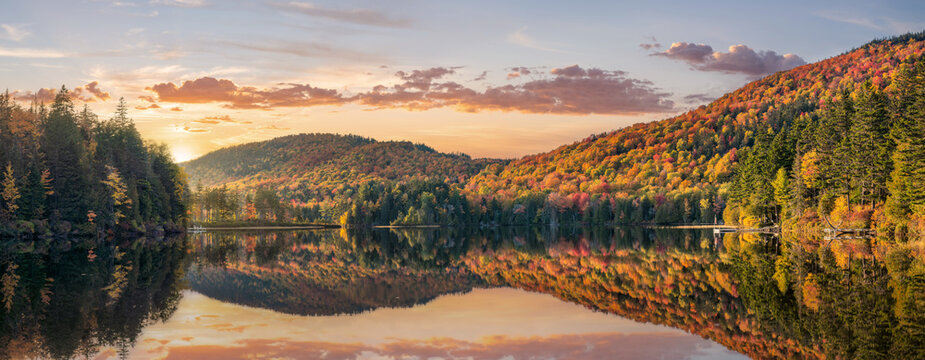 Maine  - New England golden fall foliage with sunset autumn colors 