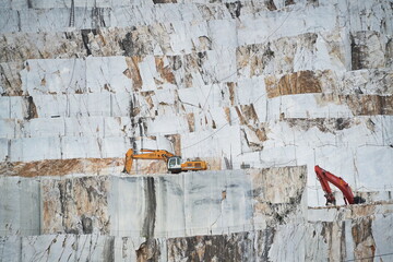 CARRARA, ITALY - June 10, 2023: View of industrial marble quarry site in Carrara