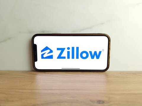 Konskie, Poland - June 17, 2023: Zillow online real estate database logo displayed on mobile phone screen
