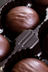 Chocolate candies in a box close up