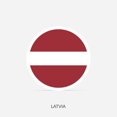 Latvia round flag icon with shadow.