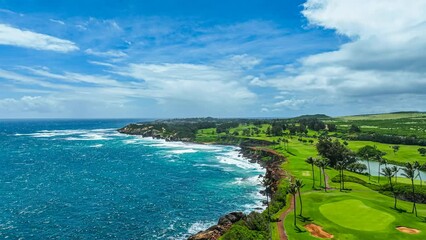 Flying over Hawaiian coastline to an aerial view of a scenic golf course