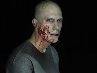 male zombie with face trauma  - obrazy, fototapety, plakaty