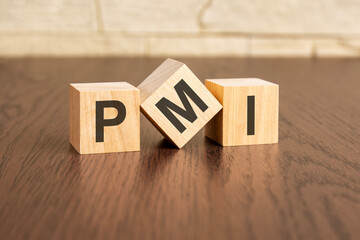 project management institute concept with symbols PMI on wooden blocks - obrazy, fototapety, plakaty