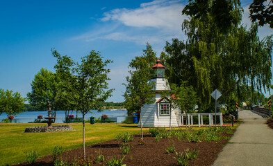 lighthouse on the shore of Lake Memphremagog in Newport , Vermont looking across at Quebec Canada
